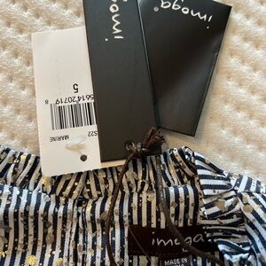 Imoga's Pia Girls Party Dress in Bermuda with blue stripes and a foil pattern.